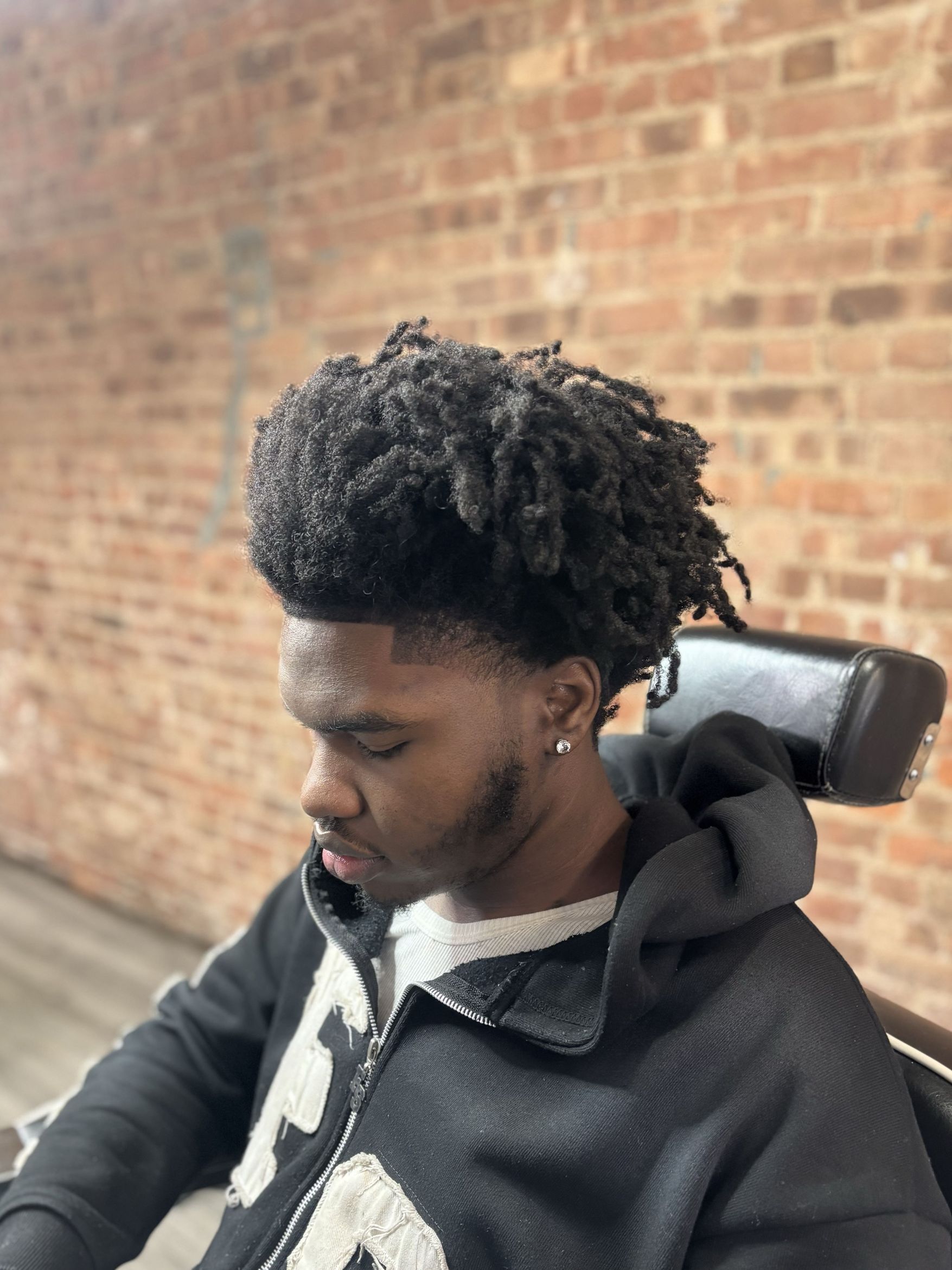 Barber finish work at East.Side.Kutz East Harlem